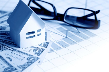 real estate market report concept with house, money, glasses, chart